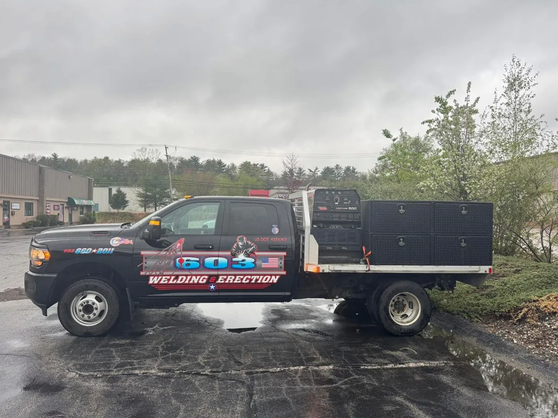 The 603 Welding and Erection flatbed truck with the diesel welder and lead boxes mounted behind the cab